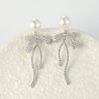 Arch14 Delicate Ribbon & Pearl 18K Gold - Plated Drop Earrings by Arch14 – Earrings photo