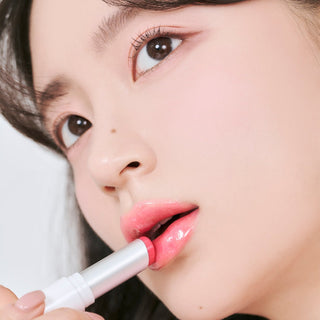 Romand Glasting Melting Balm New Bare (2 Colors) by Rom&nd – Tinted Lip Balm photo