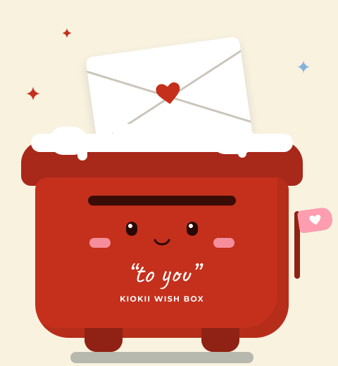 Une boîte de vœux rouge avec une lettre et un cœur